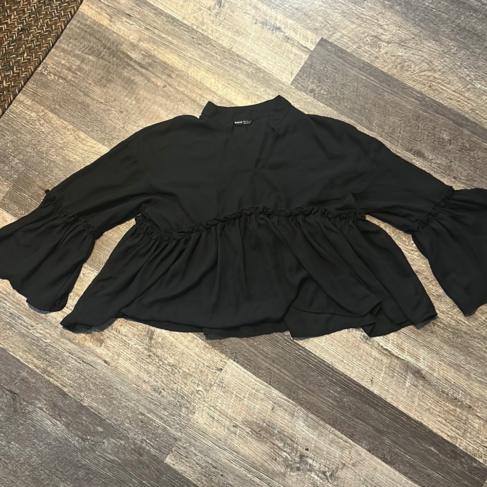 Black dress shirt, flares at waist and on arms